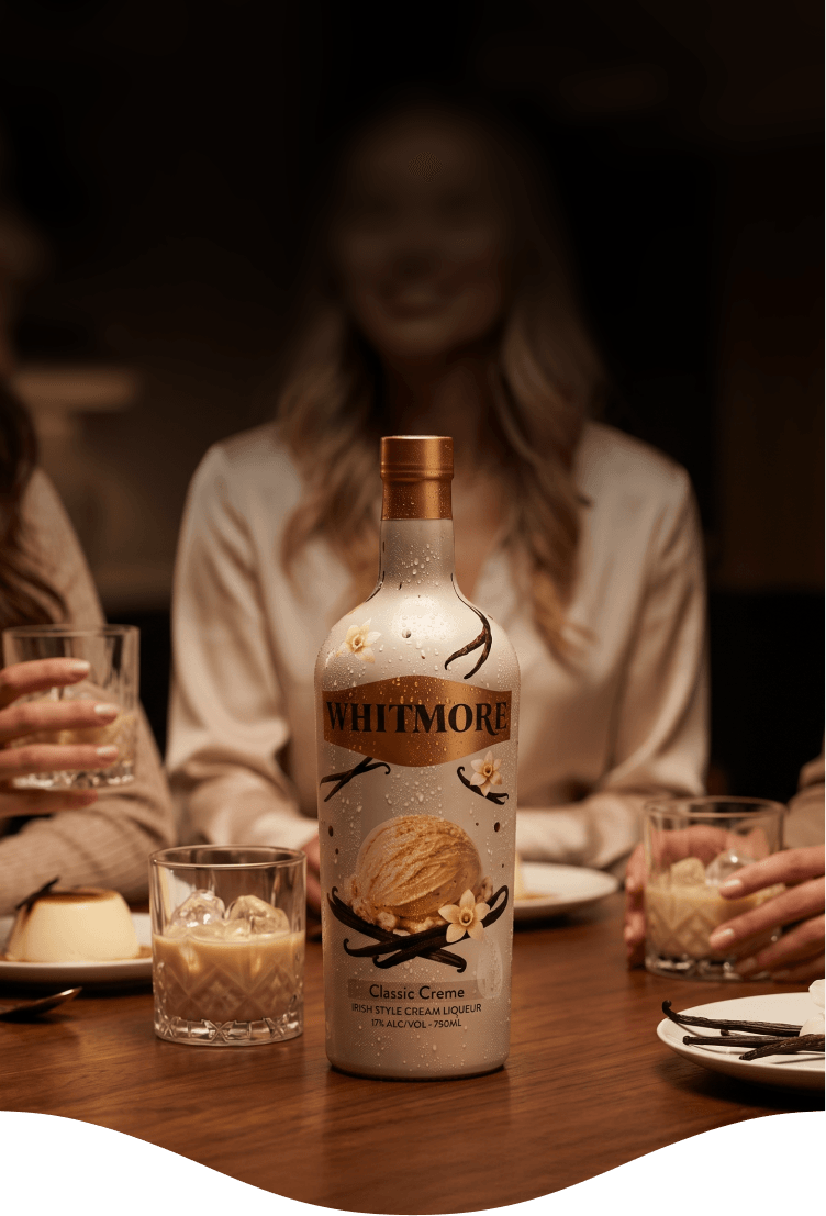 Friends sharing Whitmore Classic Crème over dessert